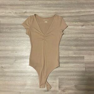 American Eagle Beige Short Sleeve Bodysuit Size Small
